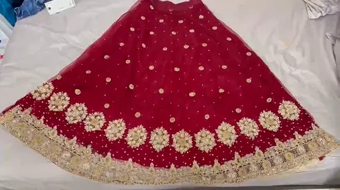 Maroon embroidered lehenga skirt with gold floral border (used)
