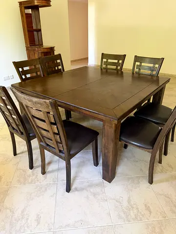 8 seater square solid wood dining table from United furniture