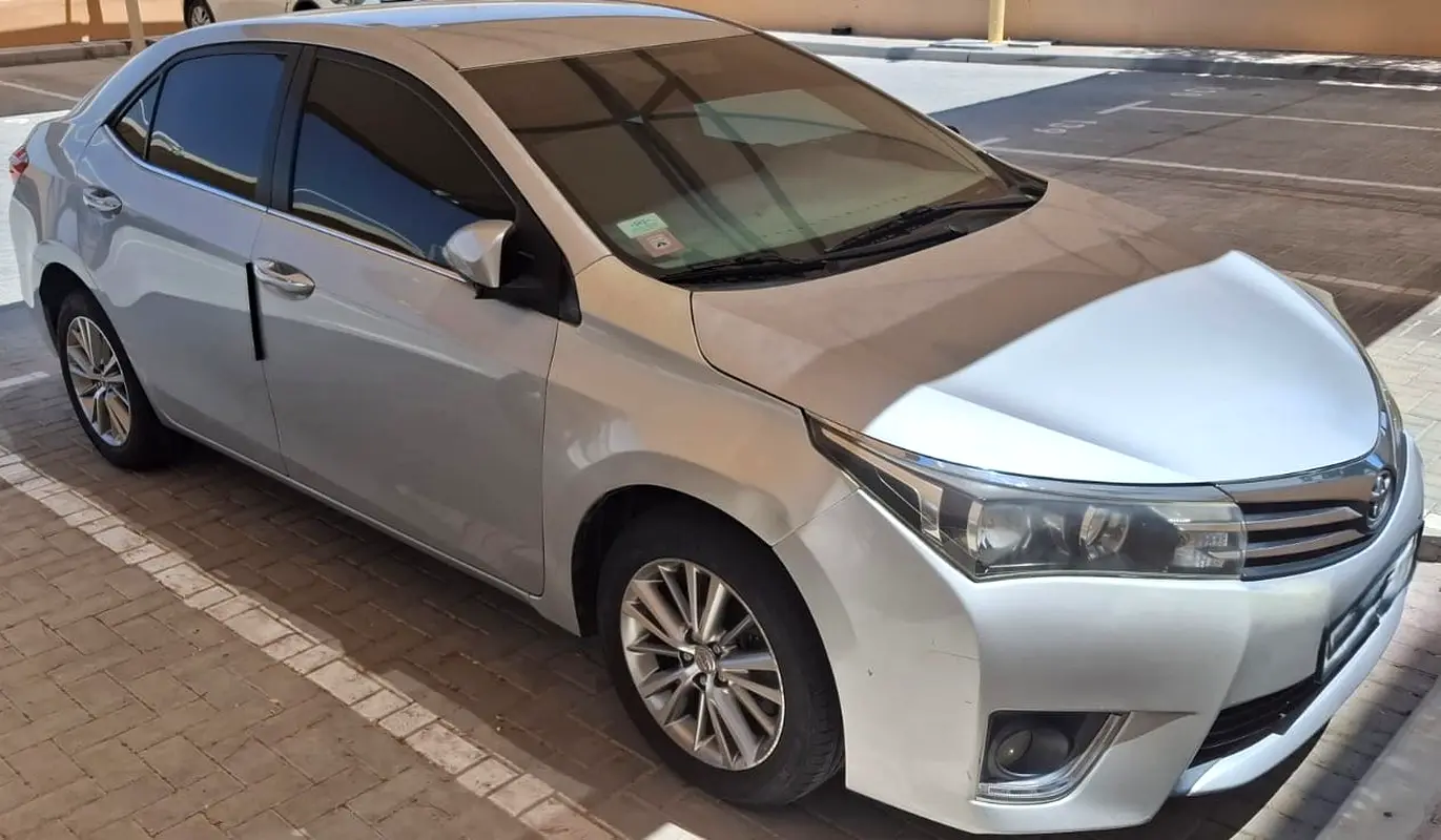 Toyota Corolla 2014 — photo 1 of 7