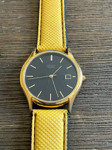 Vintage Gold-tone Citizen Quartz Men’s Watch with Black Dial and Date