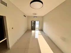 Separate living room 3 bathrooms 2 master bedrooms Built-in wardrobes Fully lit apartment Open view