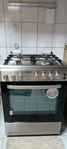 Stainless Steel 4-Burner Gas Cooker with Oven - Good WorkCondition brand new only 2.5 month old .