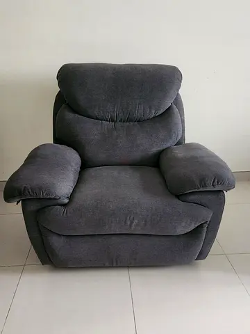 Comfortable single-seater gray fabric recliner armchair
