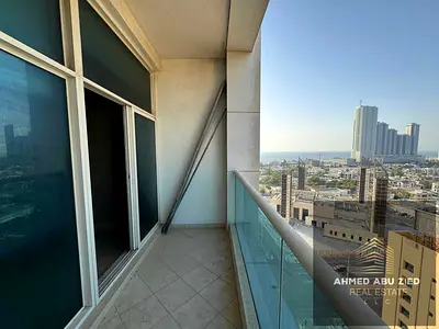 Annual sea view apartment for rent in Ajman One Towers Rashidiya, spacious bedroom and living room,