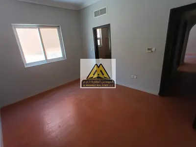 1-bedroom apartment in Al Mowaihat 1, ground floor, 2 bathrooms, parquet flooring. AED 27K yearly, 4 payments, free maintenance, prime location near s