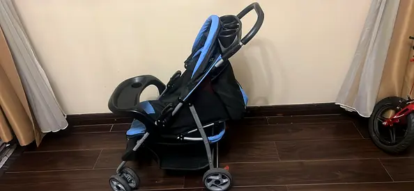 Lightweight blue baby stroller - good condition