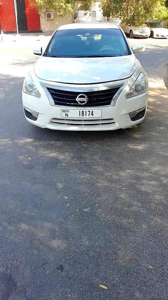Nissan Altima 2015 — photo 1 of 9