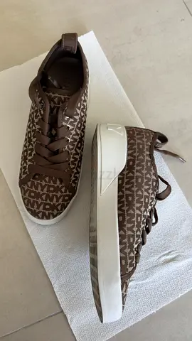 Brown DKNY monogram platform sneakers - size unknown, lightly used