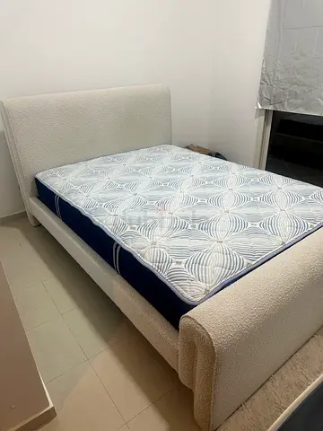 Queen bed frame with mattress - bed frame slightly  used, good clean condition and mattress new.