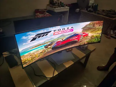 Samsung Odyssey OLED G9 (Model: LS49DG932SMXUE / G932) is a 49-inch curved ultrawide gaming monitor