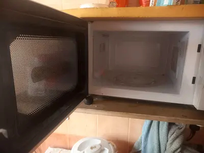 Used Nikai Microwave Oven - Compact Manual Model