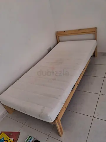 Single wooden bed frame with mattress - used