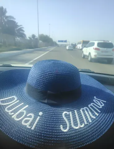 Blue wide-brim sun hat with Dubai Summer embroidery