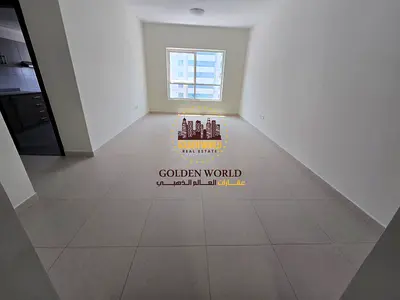 Panoramic two-bedroom apartment with a living room in a brand-new tower in Al Taawun, Sharjah, near the Dubai exit. Features an open view, a master