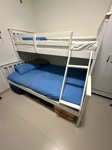 White wooden bunk bed (double on bottom, single on top) in good condition