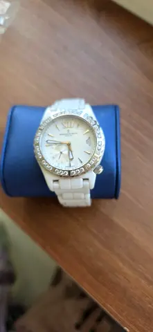 White ceramic womens wristwatch with crystal bezel