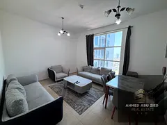 Annual furnished rental in Al Nuaimiya 3, 2-bedroom apartment with living hall, prime location oppos