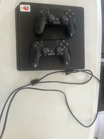 PlayStation 4 Slim with 2 Wireless Controllers - Good Working Condition