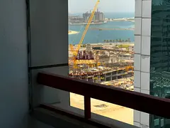**Two-bedroom apartment with a living room in Al Majaz 2, featuring a balcony, dedicated parking, an