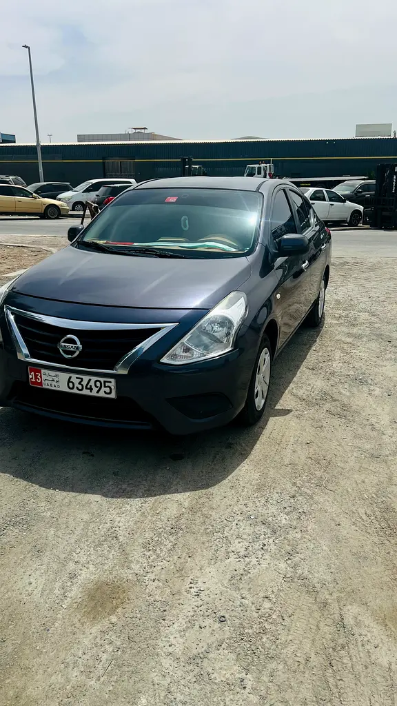 Nissan Sunny 2015 — photo 1 of 13
