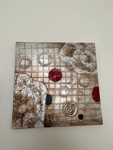 Modern textured metal wall art panel with abstract circles
