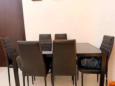 6-seater glass dining table with chairs - dark black finish