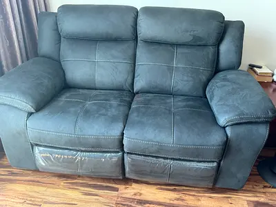 2-seater reclining loveseat in dark grey microfiber — brand new 1 month old