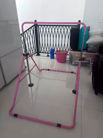 Pink Metal gymnastics bar