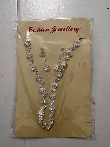Silver-tone crystal necklace and matching earrings set - new, unused