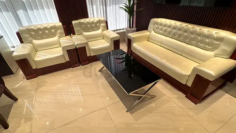 Cream Leather 3-Seater Sofa with Two Armchairs and Coffee Table - Good Condition