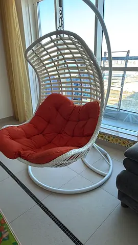 White Rattan Hanging Egg Chair with Orange Cushion - Free Standing