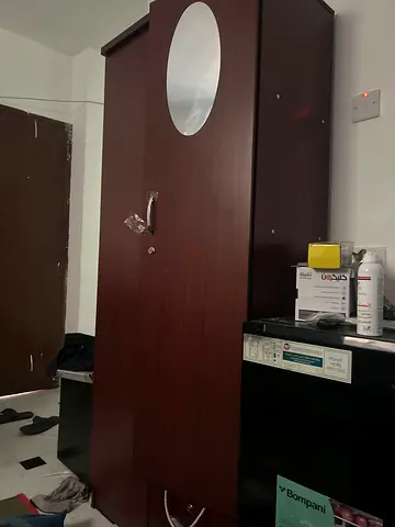 Used single-door wardrobe with mirror - dark wood finish