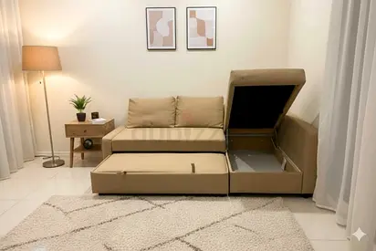 Beige L-shaped Storage Sofa Bed with Ottoman — Good Condition