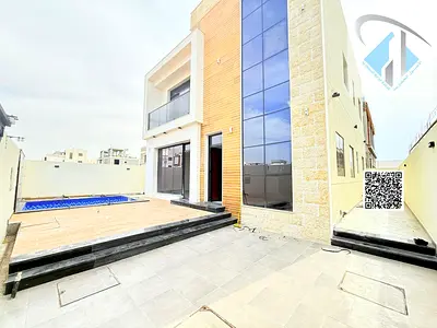 Ready with electricity and water, free registration | Own a luxury villa with a pool in Al Helio 2, Ajman | 4 master bedrooms