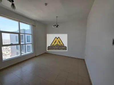 A spacious apartment with a practical layout, featuring a separate living room, balcony, closed kitchen, central AC, free maintenance from the landlor