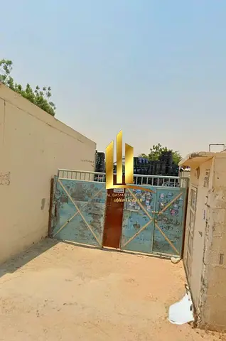 Investment Property for Sale in Al Sajaa Industrial Area with Workers Accommodation, Commercial Shops and Leased Yard on 20,000 Sq. Ft.
