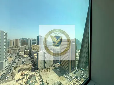 **Annual Apartment for Rent in Al Majaz 1** Free air conditioning, spacious layout, open sea view, free maintenance, central AC, and a prime location