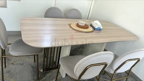 Table + 6 chairs in very good condition.