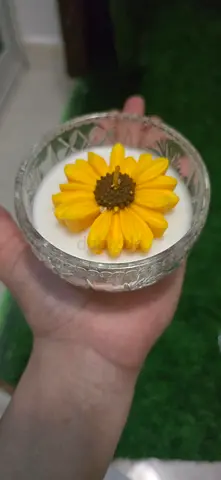 Handmade decorative soy wax candle in glass bowl with sunflower design