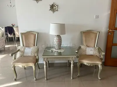 2 luxury chairs with table