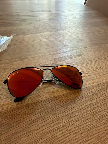 Ray-Ban aviator sunglasses for kids with red mirrored lenses — used