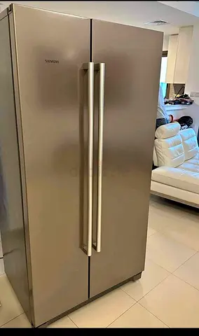 Side by side refrigerator neat and clean perfect working