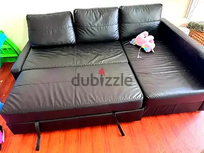 FRIHETEN Corner sofa-bed with storage, Bomstad black