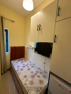 Available single partition with smart tv and fridge in Academic City