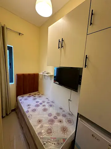 Available single partition with smart tv and fridge in Academic City