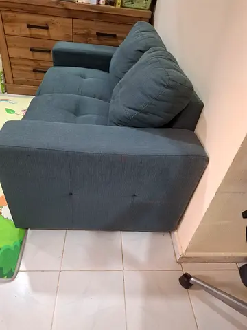 Compact two-seater sofa with ottoman - grey fabric, good condition