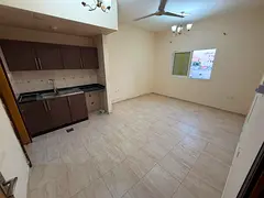 Studio for rent in Liwara Ajman near Corniche spacious studio split AC prime location easy access Du