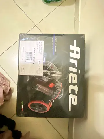 BRAND NEW Ariete red compact vacuum for sale