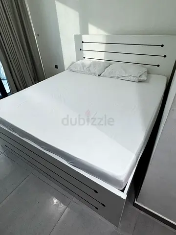 Modern white double bed frame with headboard - good condition