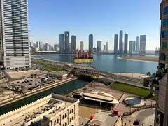 3BR apartment for annual rent in Al Khan, Sharjah. Sea view balcony, free AC &amp; parking, 2 master